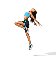 Sporty girl jumping up in silhouette. Photo of african american girl in fashionable sportswear on white background. Dynamic movement. Side view. Full length. Sports and healthy lifestyle