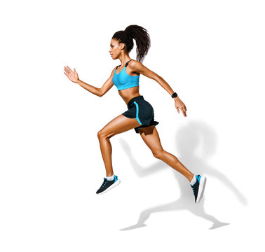 Sporty girl runner in silhouette. Photo of african american girl in fashionable sportswear on white background. Dynamic movement. Side view. Full length. Sports and healthy lifestyle