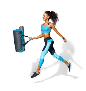 Go to training. Sporty girl with bag in motion. Photo of african american girl in fashionable sportswear on white background. Dynamic movement. Side view. Full length. Sports and healthy lifestyle