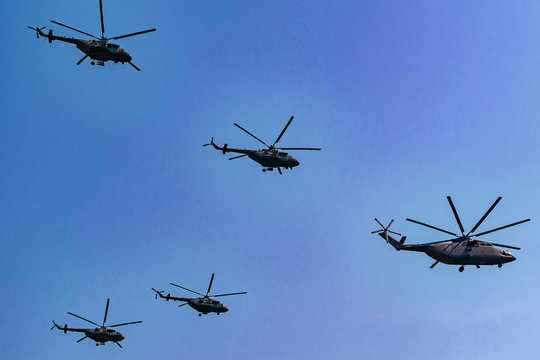 Moscow, Russia - May 04, 2018:  heavy transport helicopter of Russian air force Mi - 26 and three Mi - 8 during Victory Day parade rehearsal