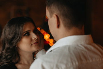 tender and sensual hugs of husband and his pregnant wife