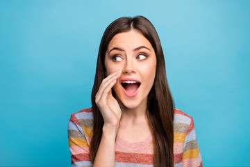 Close-up portrait of her she nice-looking lovely pretty curious girlish cheerful cheery girl saying good news isolated over bright vivid shine vibrant blue color background