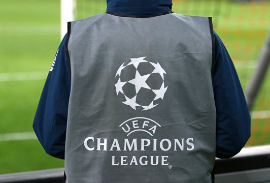 Official UEFA Champions League Logo On The Back Of Ballboy's Bib