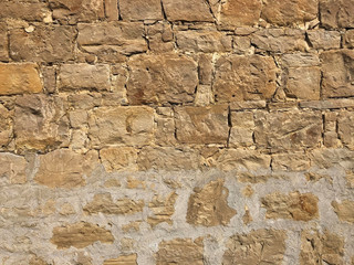 Yellow old stone wall with cement. Industrial background. Copy space