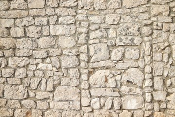 Old stone wall with walled window