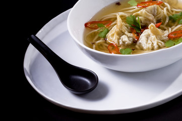 Miso Ramen with dim sum and vegetables in a bowl
