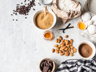 Cooking flat lay of various food ingredients for baking on a white background. Copy space. Top view. Baking concept. Mockup.