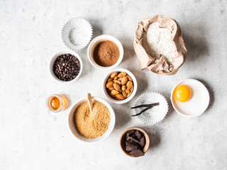 Cooking flat lay of various food ingredients for baking on a white background. Top view. Baking...