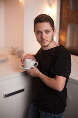 young man with coffee cup
