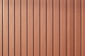 Brown background of metal wall siding, cladding.