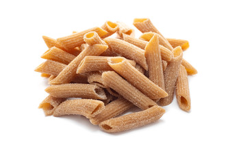 Raw Wholegrain penne pasta isolated on a white background