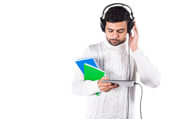 Attractive guy listens to music