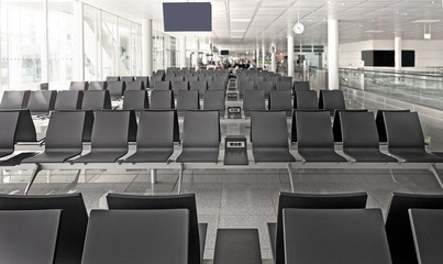 Empty Rows of brown chair In perpective at airport,