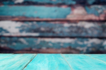 Empty wooden aqua menthe background against rustic wooden wall
