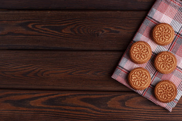 Sandwich biscuits, Cream biscuits, Cookies with cream filling on wooden table
