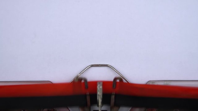 Appendix - word printed on an old typewriter in red letters, close up. vintage inscription