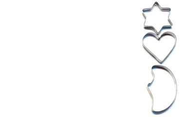 forms for baking cookies and Pryanikov metal. on white background. confectioner's inventory