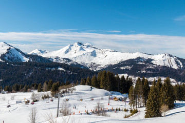 Fototapeta na wymiar View of the mountains from the Morzine ski slopes in the French Alps during winter