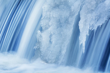 Winter, Portage Creek Cascade captured with motion blur and framed by ice, Milham Park, Kalamazoo,...