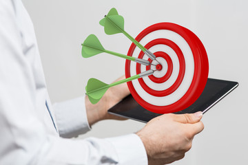 Dart arrow on target dartboard, Business success concept..
