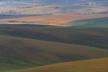Bends and curves of fields on hills