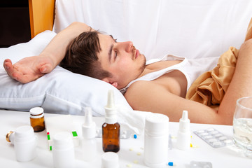 Obraz na płótnie Canvas Sick Man in the Bed