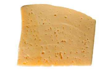 Piece of yellow cheese Isolated on a white background. Top view. Close-up.