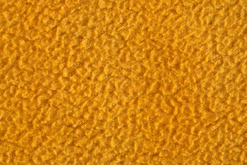 Texture of yellow fabric close-up, fabric fibers macro.