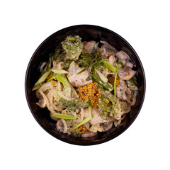 Harusame with pork in honey sauce. Serving in a restaurant. Wok. Isolated on a white background. View from above.