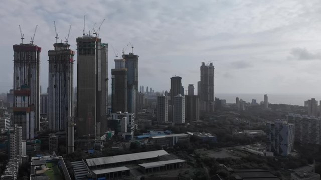 Urban Jungle, Tall towers of Mumbai, Cloudy aerial View, 4k