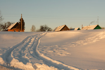winter snowy road to a remote village