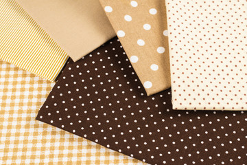 Fototapeta premium Mix of beige, white and brown cotton fabric.