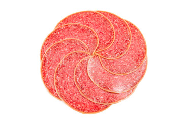 Salami slices isolated on white background.