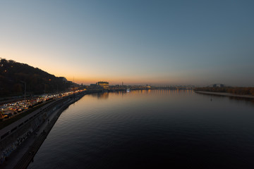 Fototapeta na wymiar Scenic view over Kiev and the Dnieper River on overcast day