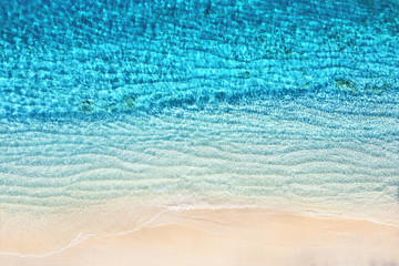 Fototapeta na wymiar Sea coast as a background from top view. Azure water background from top view. Summer seascape from air. Travel - image