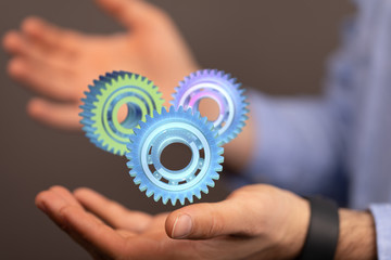 Business, Internet and technology concept. Business select gear icon on virtual screen.