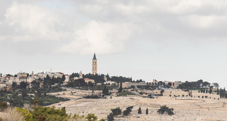 View of the old city of Jerusalem, jewish cemetery and the The Russian Church on Mount Eleon from the Abu Tor district of Jerusalem city in Israel