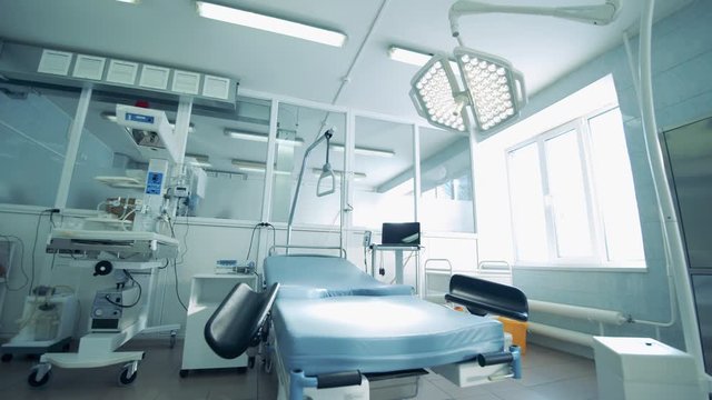 Hospital bed in an empty labour ward