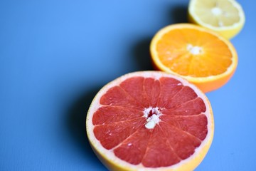 Naklejka na ściany i meble orange and grapefruit on a plate