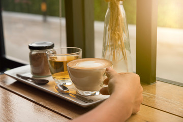 Coffee served with tea and brown sugar one morning