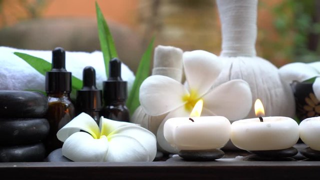 Spa beauty massage healthy wellness background. Spa Thai therapy treatment aromatherapy for body woman with flower nature candle for relax summer time. Lifestyle and Cosmetic Concept