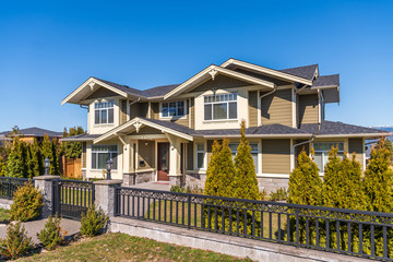A perfect neighbourhood. Houses in suburb in the north America. Luxury houses with nice landscape.