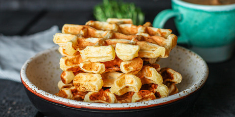 Belgian or american waffles (delicious sweet dish, dessert snack) menu concept. background. top view. copy space for text