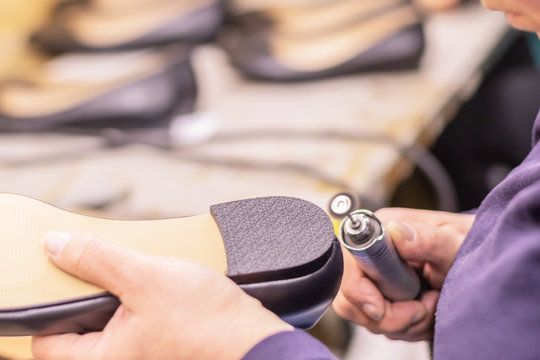 Shoe production process in factory, leather shoemaking