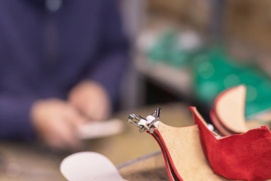 Shoe production process in factory, leather shoemaking