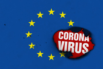 Flag of European Union with burned out hole showing Coronavirus name in it. 2019 - 2020 Novel Coronavirus (2019-nCoV) concept, for an outbreak occurs in EU.