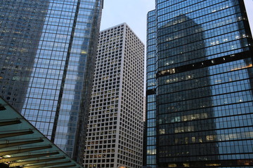 Fototapeta na wymiar offices and glass buildings in the city of life, low angle view in Hong Kong Central financial zone 