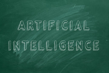 Obraz premium Hand drawing and animated text Artificial intelligence on green chalkboard.