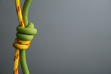 double fisherman bend knot yellow green climbing rope - obrazy, fototapety, plakaty