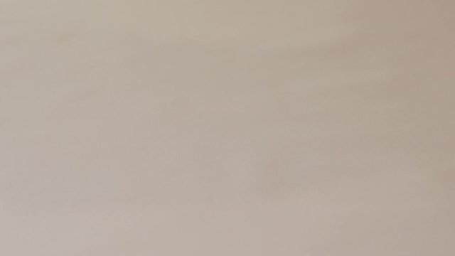 Roll of drawing paper being unrolled and placed on table. Perfect for drawing, sketching or colouring - this drawing paper has a multitude of uses and can be used for preparing posters, drawing sketch